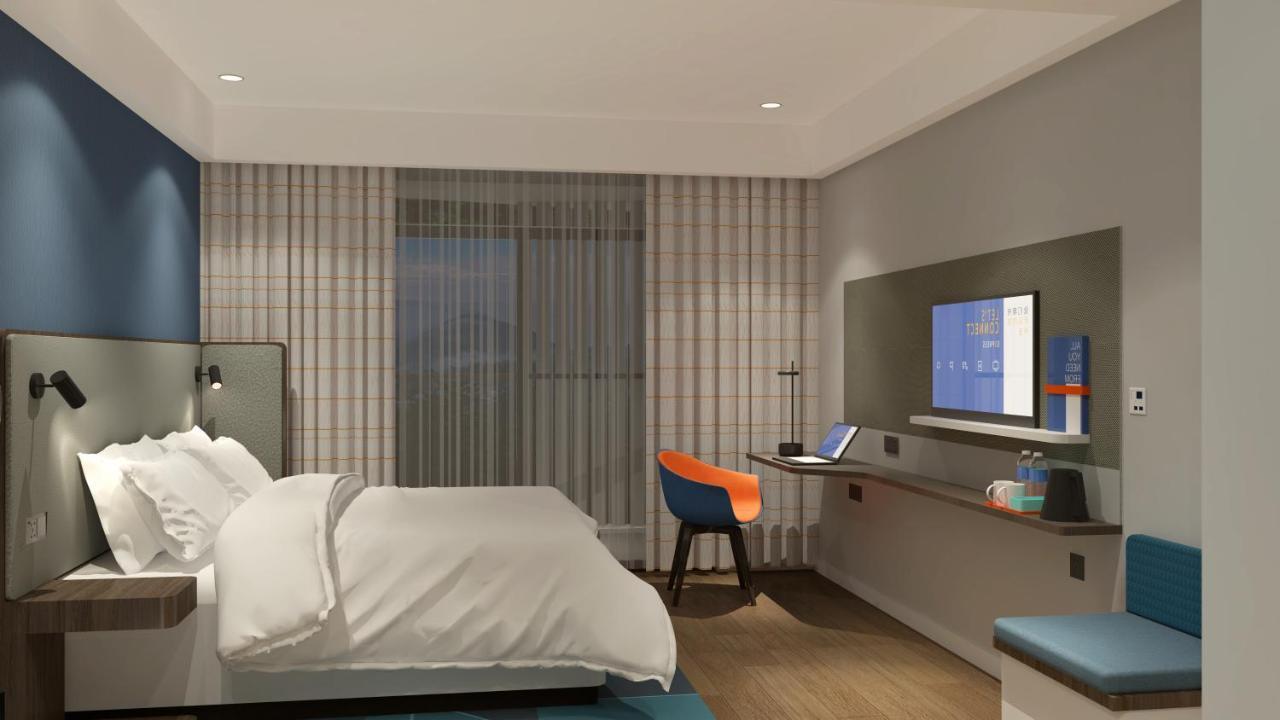 Holiday Inn Express Qiliping By Ihg Эмэйшань Номер фото